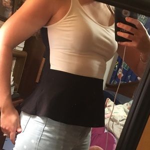 Tank top made out of 95% cotton. Super soft.